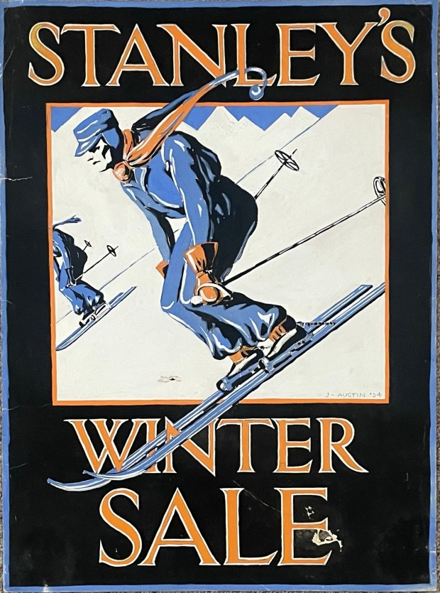 Poster showing a man skiing downhill in 1930s ski gear, with the word STANLEY'S above and WINTER SALE below
