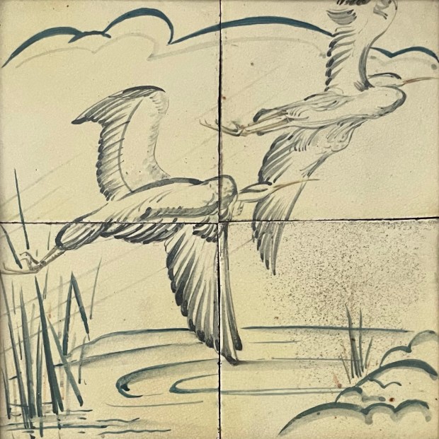 Image of 4 ceramic tiles with a picture of two herons flying low over a pond painted on them